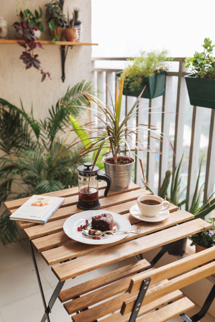 Winter Sun, afternoon coffee  & a little reading on the side in small space balcony 