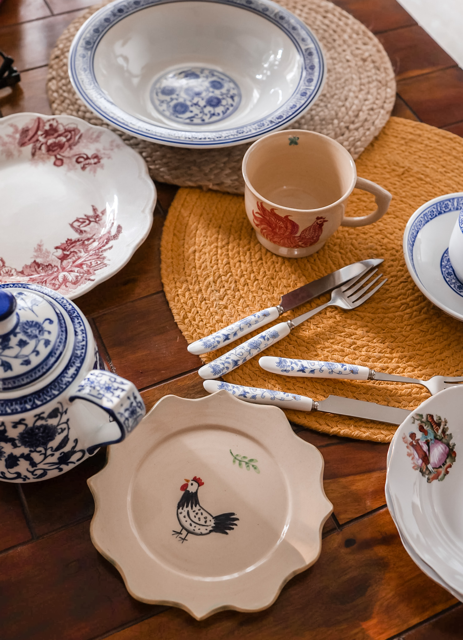 A medley of Ceramic plates and spoons