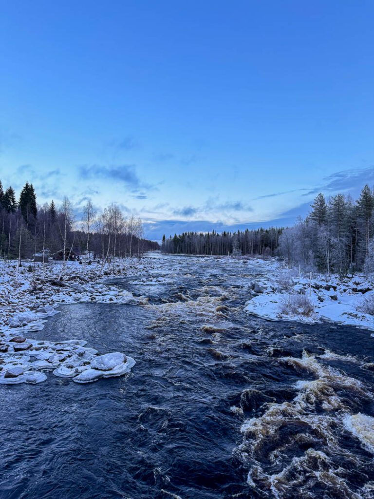Frozen river in the arctic finnish lapland