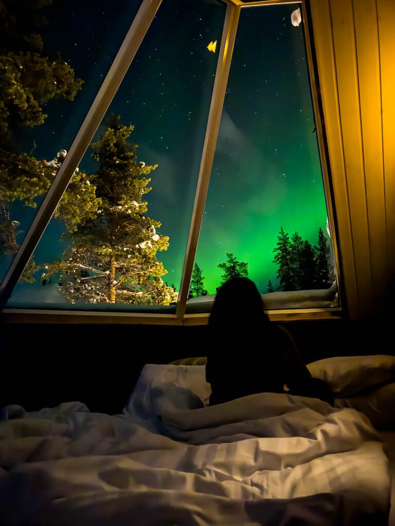 Watching the northern lights from a glass igloo